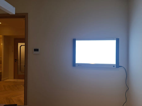 Installation d'un négatoscope extra plat dans un cabinet de gynécologie à Biarritz